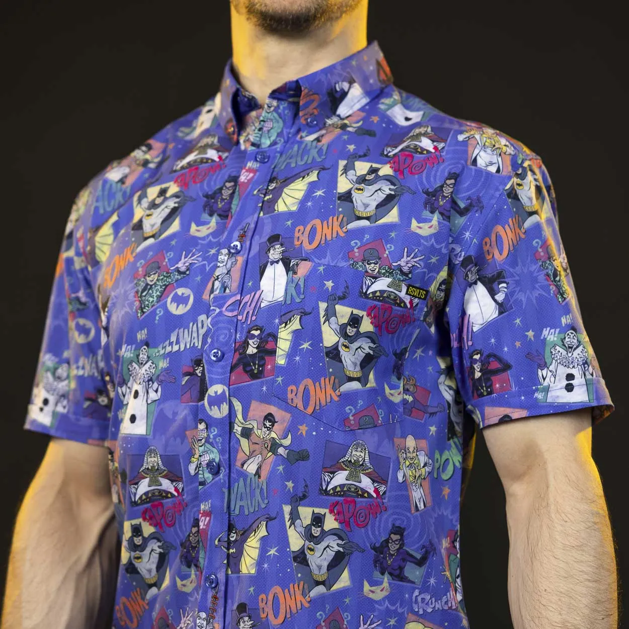 Batman™ 85th Anniversary "Kapow! Bonk! Thwack!" – KUNUFLEX Short Sleeve Shirt