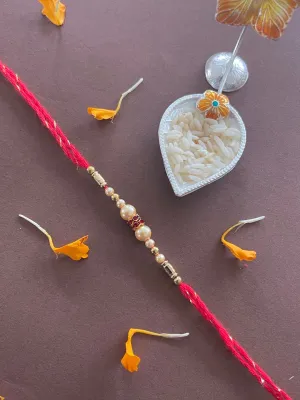 Beautiful Simple Pearl Rakhi With Beads Red Thread Rakhi For Raksha Bandhan