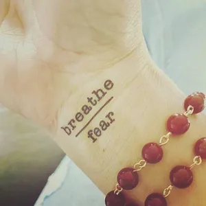 Breathe Over Fear Manifestation Tattoo