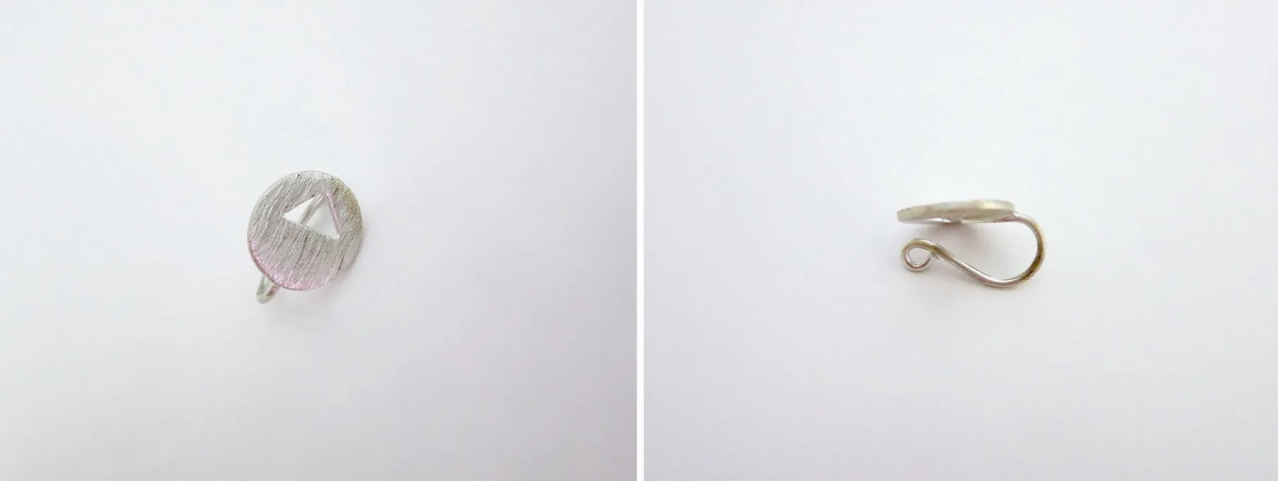 Chic, brush-finish, circular nose pin with a cut-out