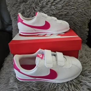 Kids Nike Cortez size 3y white/Pink