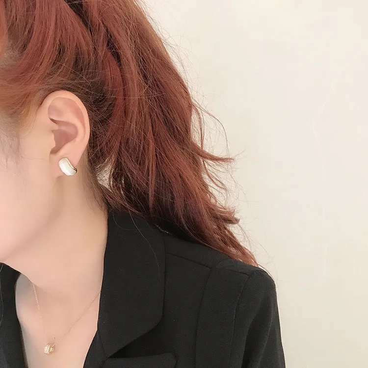 Simple hundred-touch cat-eye stone arc 925 ear pin