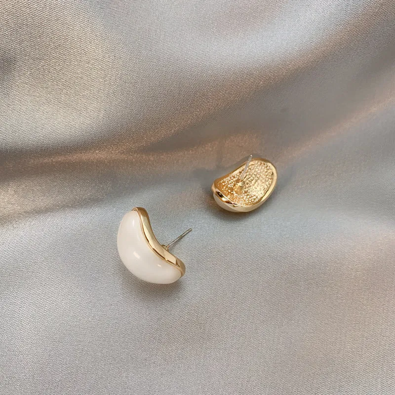 Simple hundred-touch cat-eye stone arc 925 ear pin