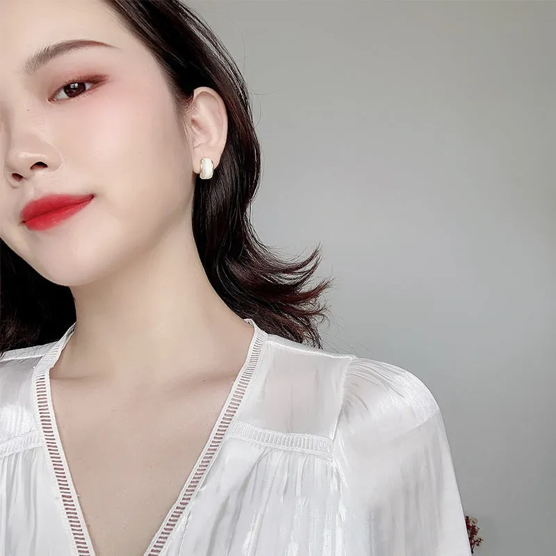 Simple hundred-touch cat-eye stone arc 925 ear pin